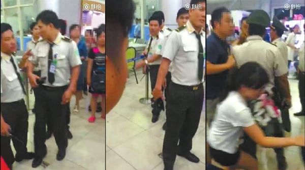 越南机场承认安检员曾肘击中国游客背部 越南机场承认安检员曾肘击中国游客背部